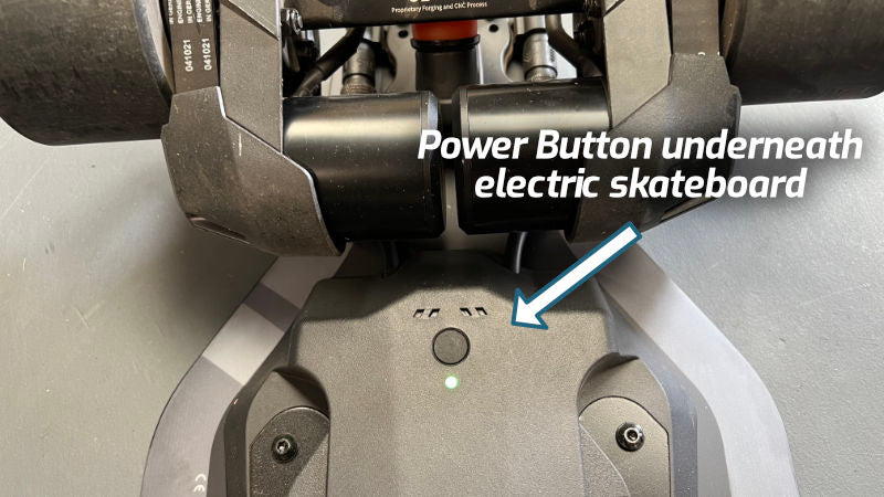 power button underneath electric skateboard