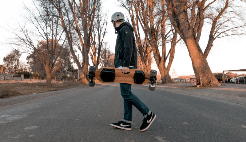 riding an e-skateboard in winter