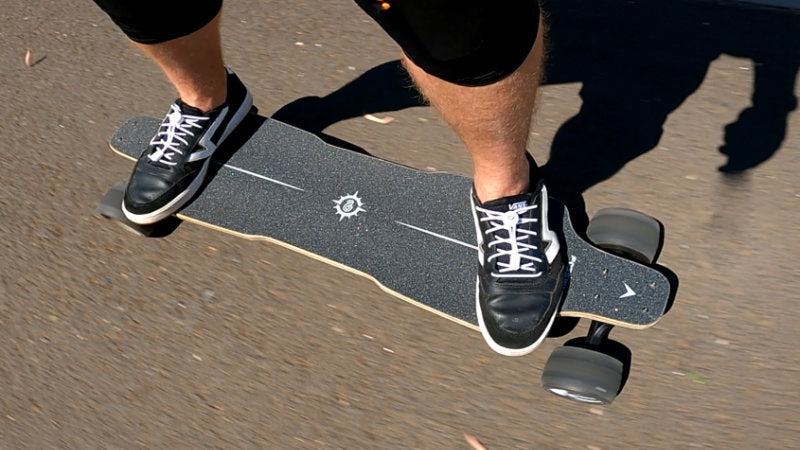 riding the electric skateboard